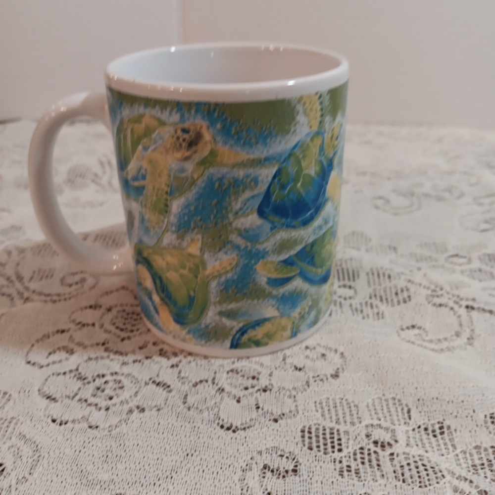 Coffee cup dolphins underwater scene